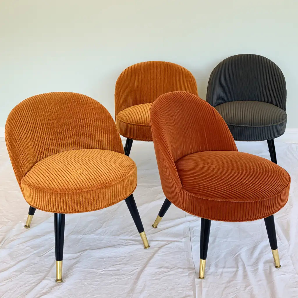 Poltrona dal design essenziale, arancione, per la casa